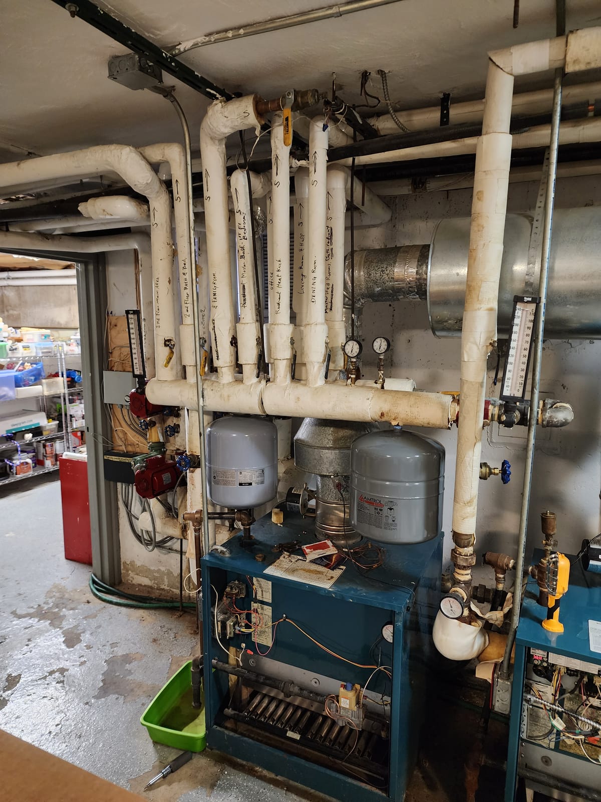 Boiler room with complex piping and expansion tanks