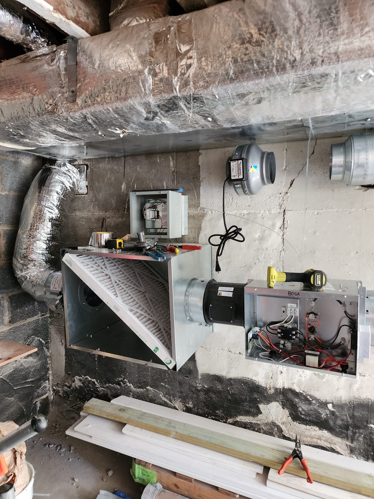 Three Cooper Hunter condensers in backyard installation