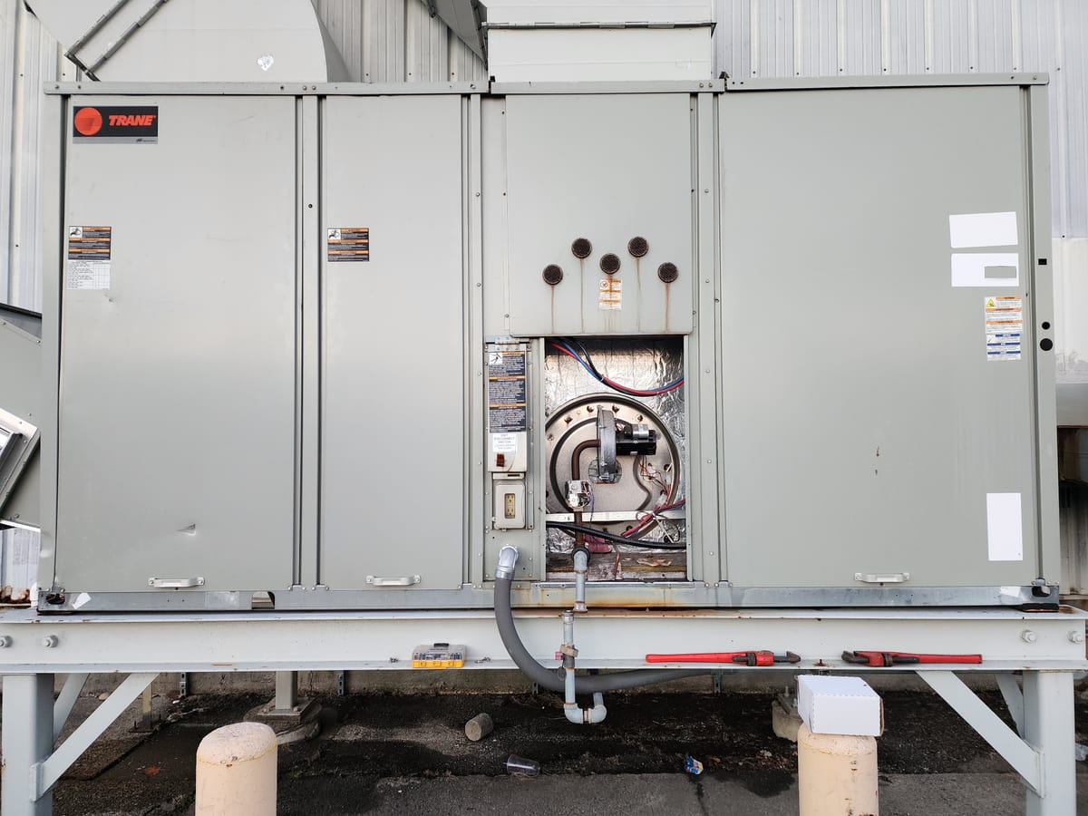 Gas burner blue flame closeup inside furnace