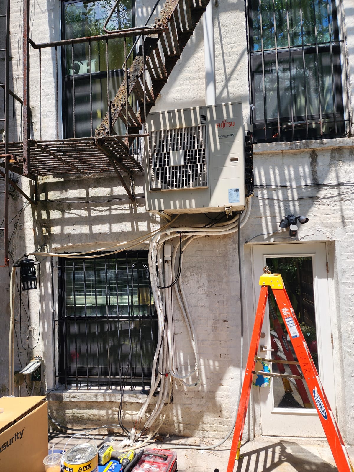 Carrier rooftop condenser open for maintenance